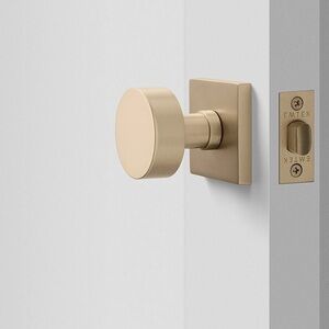 Schoolhouse brand - satin brass passage door knob